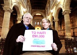 Dean McKelvey presents a cheque to Margaret Boden of Christian Aid. The money will go directly to help victims of the Haiti earthquake. Phot: Alan Lewis Photopess Belfast.